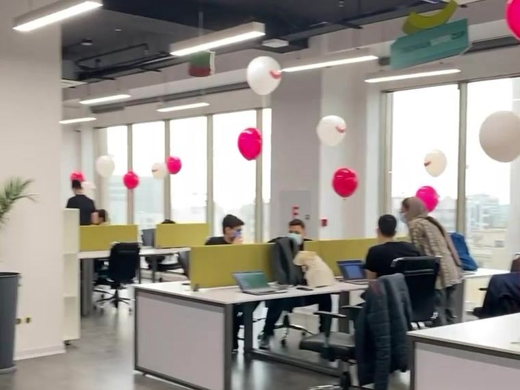 Digikala office decorated with balloons and a Nowruz banner during the new year campaign